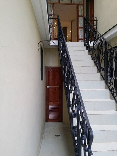 'Escaleras a habitaciones' Casas particulares are an alternative to hotels in Cuba.